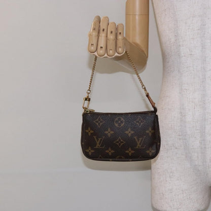 Louis Vuitton Mini pochette accessoires Canvas, BROWN, CANVAS, Clutche & pouche