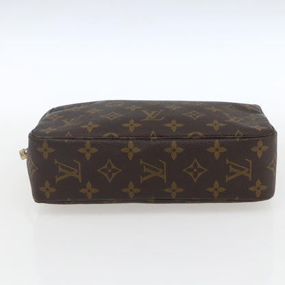 Louis Vuitton Trousse Toilette Monogram Canvas, BROWN, CANVAS, Clutche & pouche