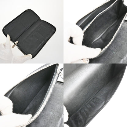 Louis Vuitton Zippy wallet vertical Taurillon Leather, BLACK, LEATHER, Wallets