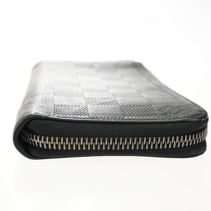 Louis Vuitton Zippy wallet vertical Damier Infini Leather, BLACK, LEATHER, Wallets