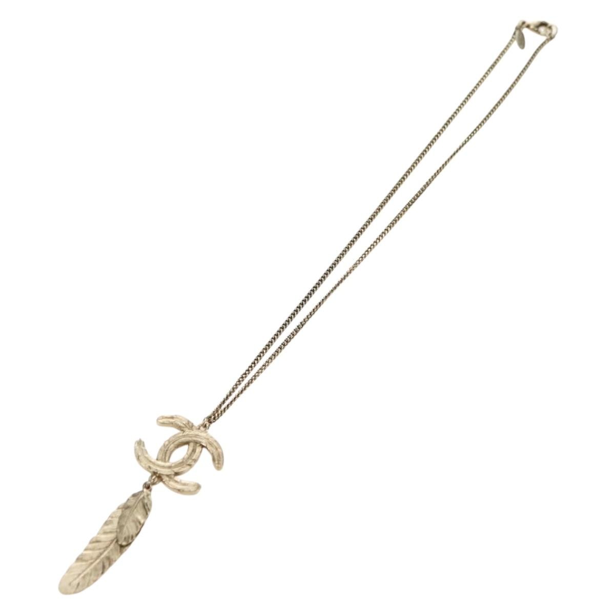 Chanel Feather CC Pendant Necklace Metal, Gold, Metal, Necklace