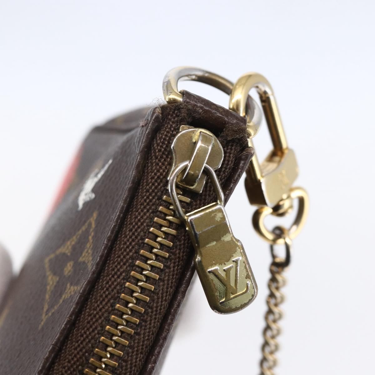 Louis Vuitton Pochette Accessoires Limited Edition Christmas Animation Monogram Canvas, BROWN, CANVAS, Clutche & pouche