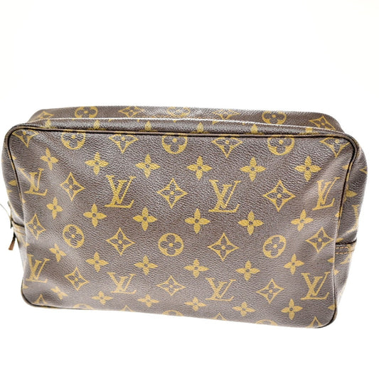 Louis Vuitton Trousse Toilette Monogram Canvas, BROWN, CANVAS, Clutche & pouche