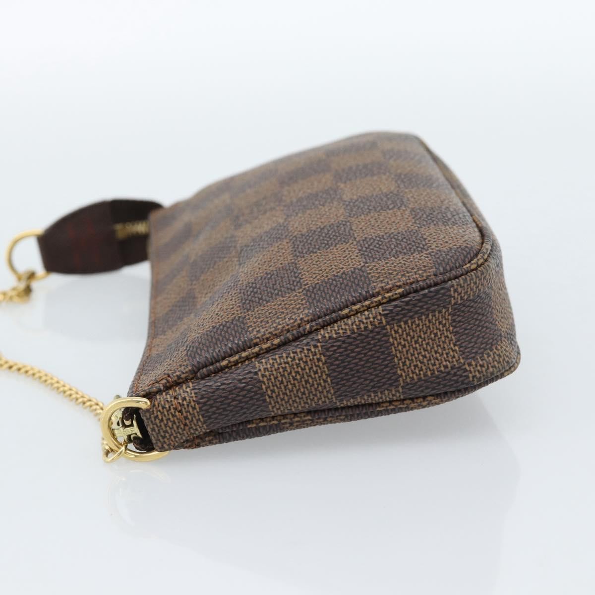 Louis Vuitton Mini pochette accessoires Damier Canvas, Brown, Canvas, Clutch
