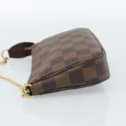 Louis Vuitton Mini pochette accessoires Damier Canvas, Brown, Canvas, Clutch