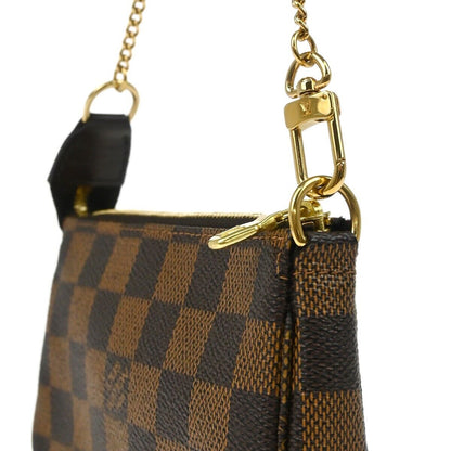 Louis Vuitton Pochette Accessoires Limited Edition Damier, BROWN, CANVAS, Clutche & pouche