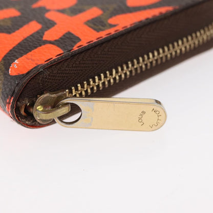 Louis Vuitton Porte-Monnaie Zippy Wallet monogramme empreinte, Orange, Canvas, Wallet