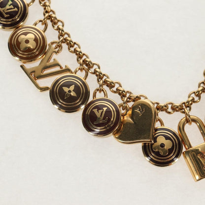 Louis Vuitton Pastilles Bag Charm and Key Holder Metal and Enamel, GOLD, METAL, Charms and Keychains