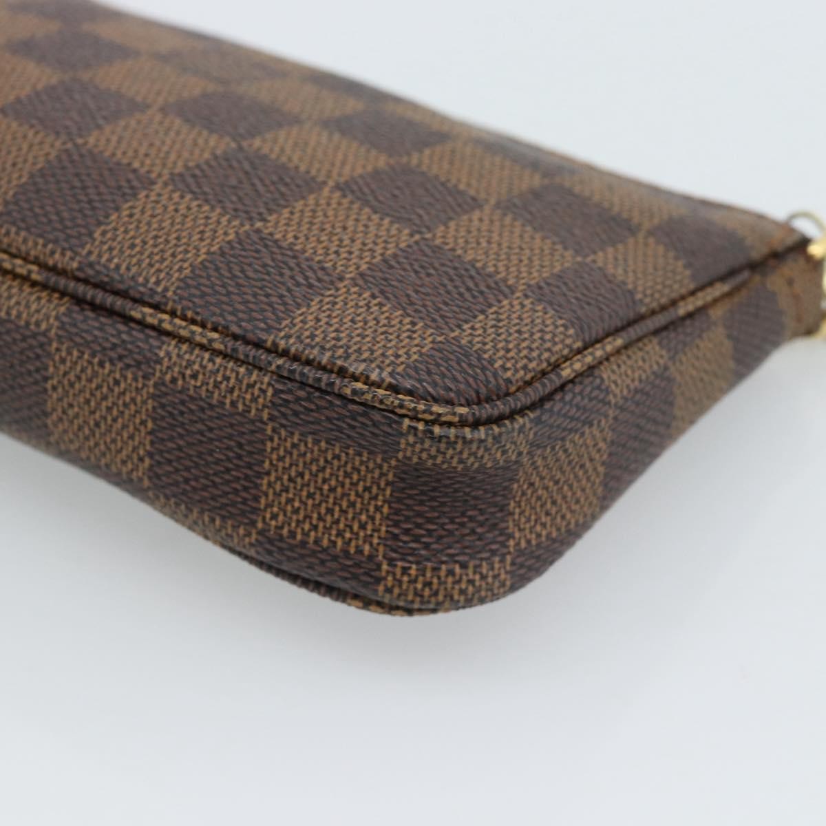 Louis Vuitton Mini pochette accessoires Damier Canvas, Brown, Canvas, Clutch