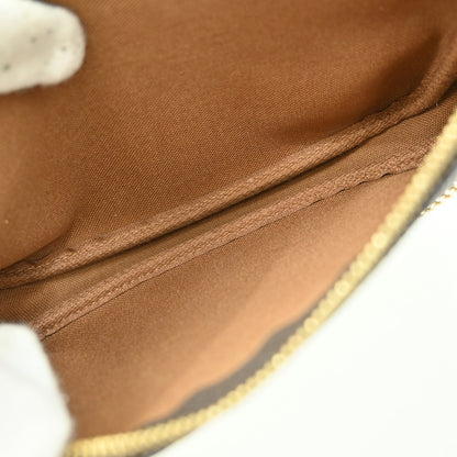 Louis Vuitton Mini pochette accessoires Canvas, BROWN, CANVAS, Clutche & pouche