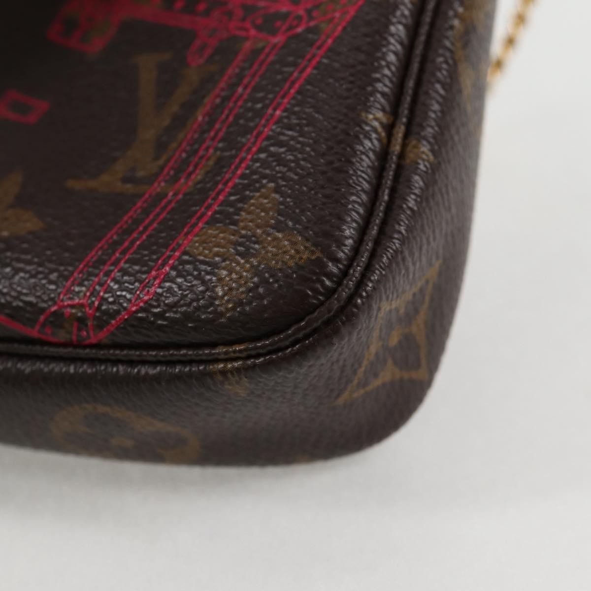 Louis Vuitton Pochette Accessoires Limited Edition Christmas Animation Monogram Canvas, BROWN, CANVAS, Clutche & pouche