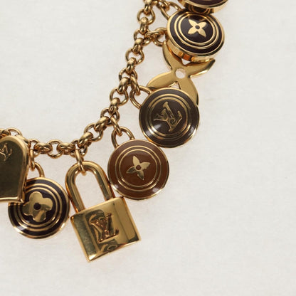Louis Vuitton Pastilles Bag Charm and Key Holder Metal and Enamel, GOLD, METAL, Charms and Keychains