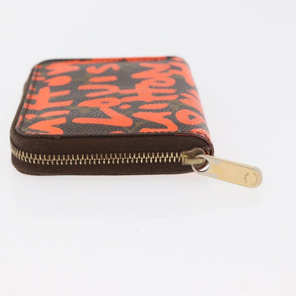 Louis Vuitton Porte-Monnaie Zippy Wallet monogramme empreinte, Orange, Canvas, Wallet