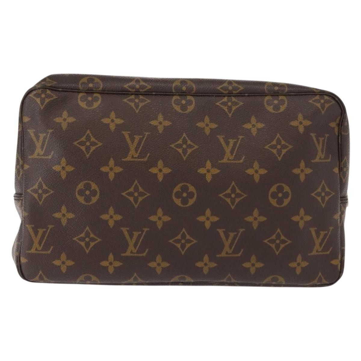 Louis Vuitton Trousse Toilette Monogram Canvas, BROWN, CANVAS, Clutche & pouche
