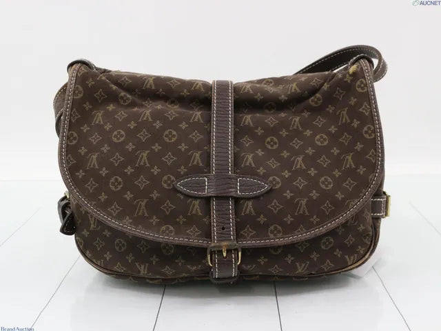 Louis Vuitton Neo Saumur Limited Edition Since 1854 Monogram Jacquard and Leather, Brown, Canvas, Handbag