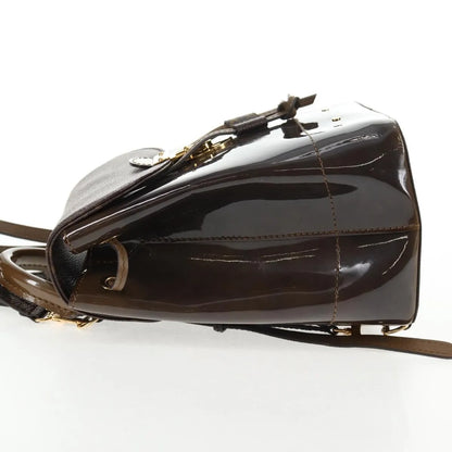 Louis Vuitton Hot Springs Vernis with Monogram Canvas, Brown, Canvas, Backpack