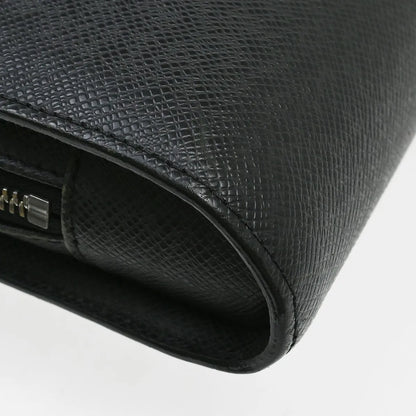 Louis Vuitton Pochette Baikal Clutch Taiga Leather, Black, Leather, Clutch