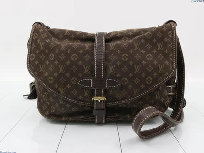 Louis Vuitton Neo Saumur Limited Edition Since 1854 Monogram Jacquard and Leather, Brown, Canvas, Handbag