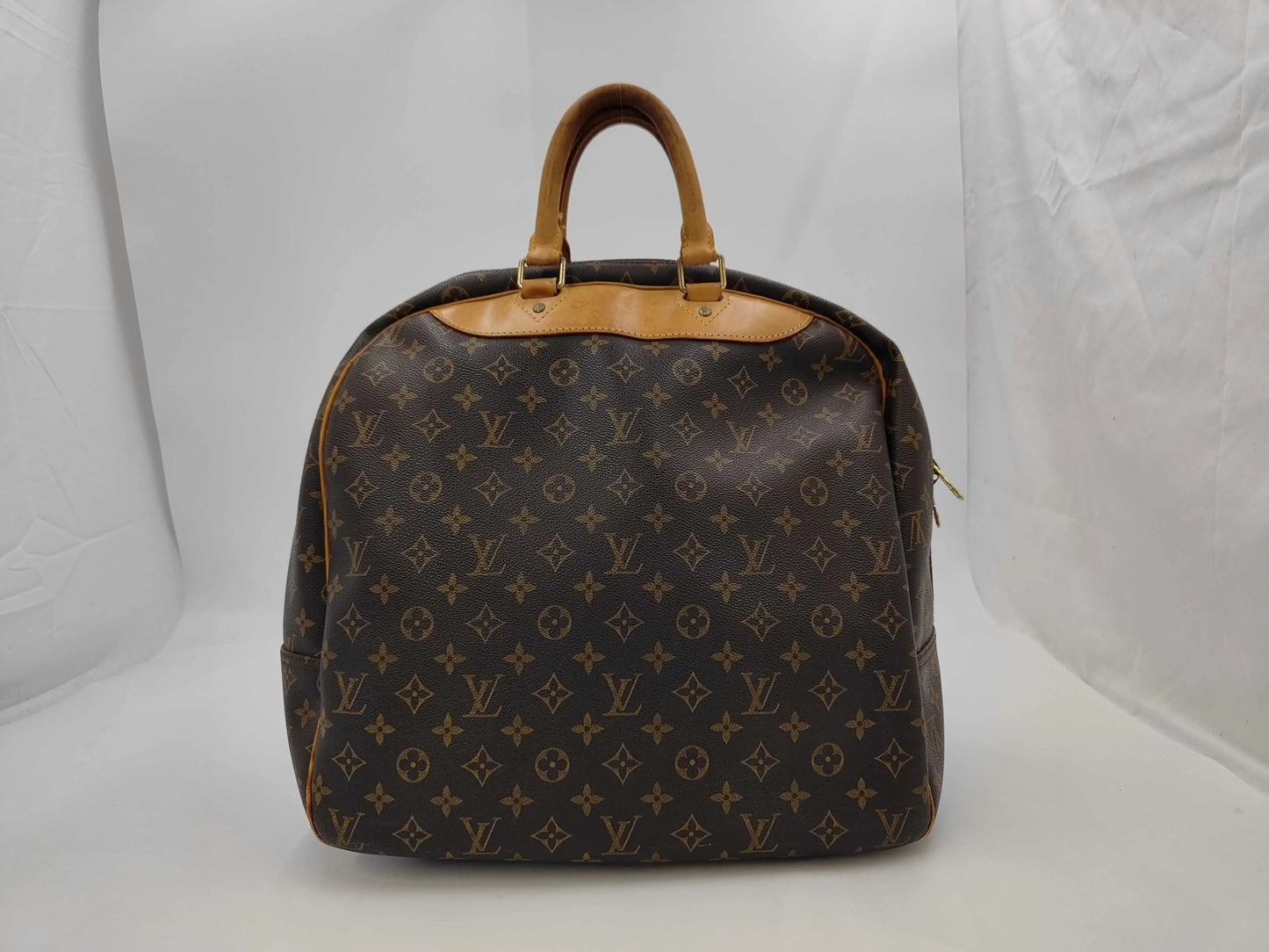 Louis Vuitton Evasion Monogram Canvas, Brown, Canvas, Travel Bag