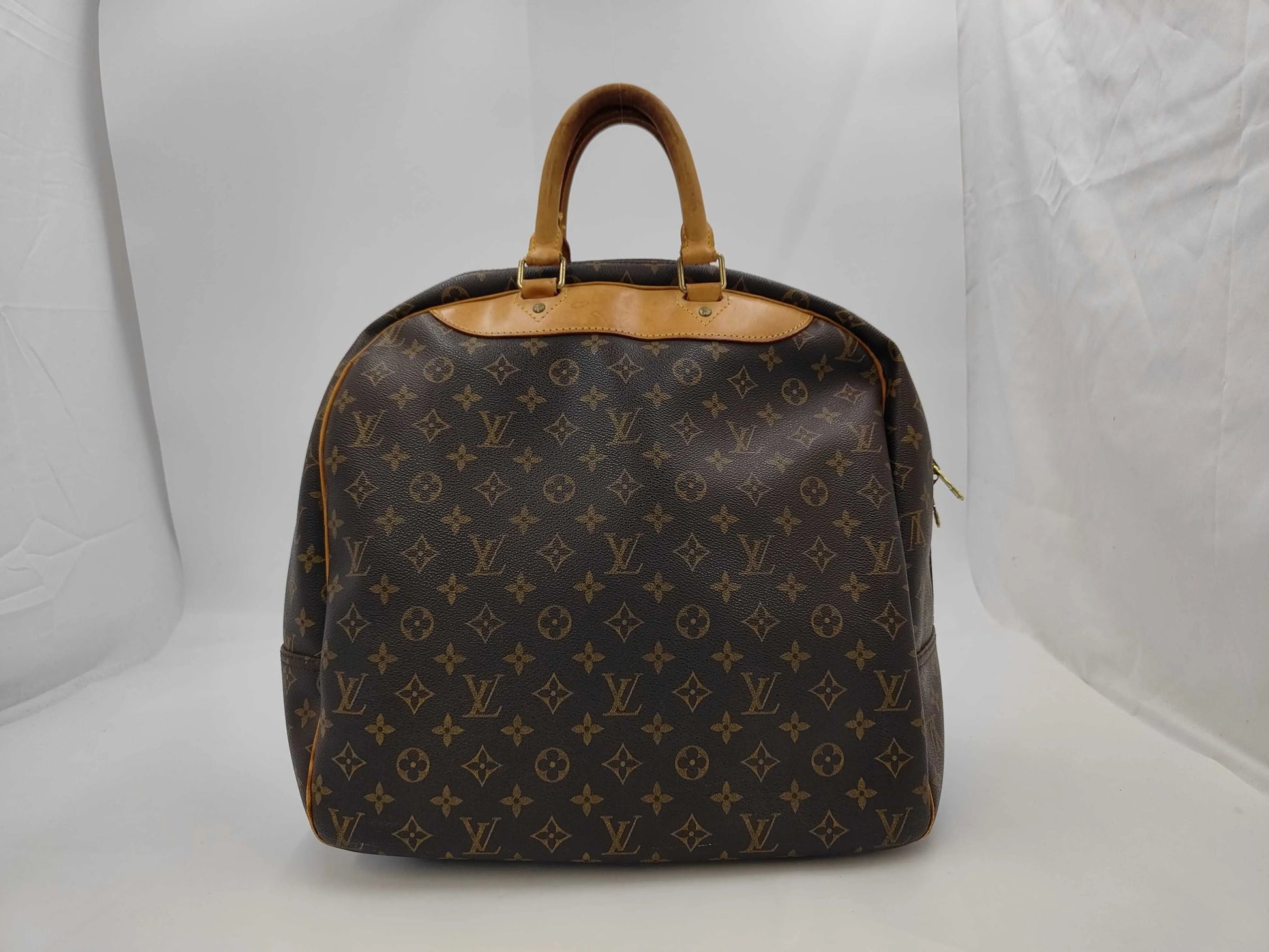Louis Vuitton Evasion Monogram Canvas, Brown, Canvas, Travel Bag