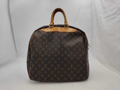 Louis Vuitton Evasion Monogram Canvas, Brown, Canvas, Travel Bag