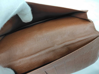 Louis Vuitton Long Wallet Bifold monogram canvas, Brown, Canvas, Wallet