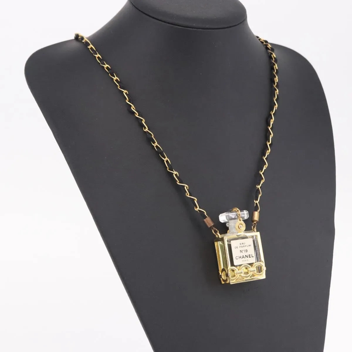 "Chanel CC Perfume Bottle Pendant Chain Long Metal with Leather, Crystals and Faux Pearl", Gold, Metal, Necklace