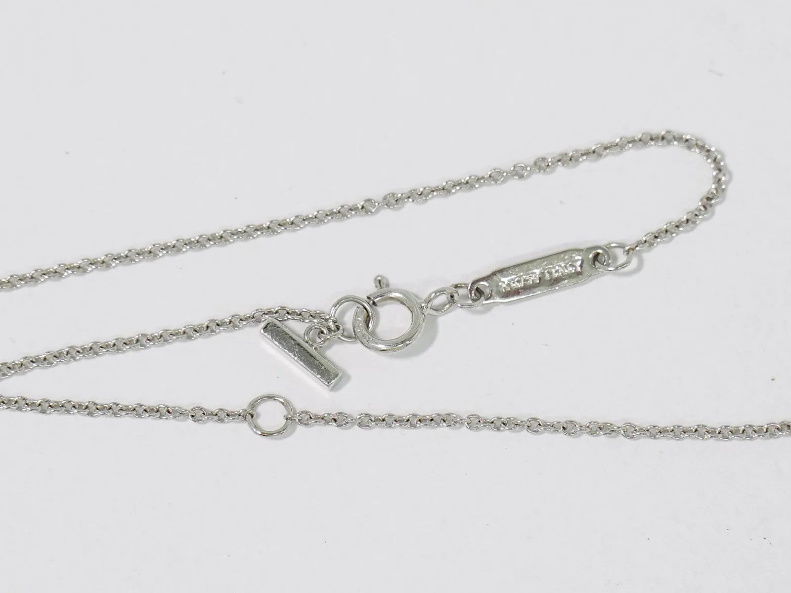 Tiffany & Co. T Smile Pendant 18K White Gold with Pink Sapphires, Silver, White Gold, Necklace