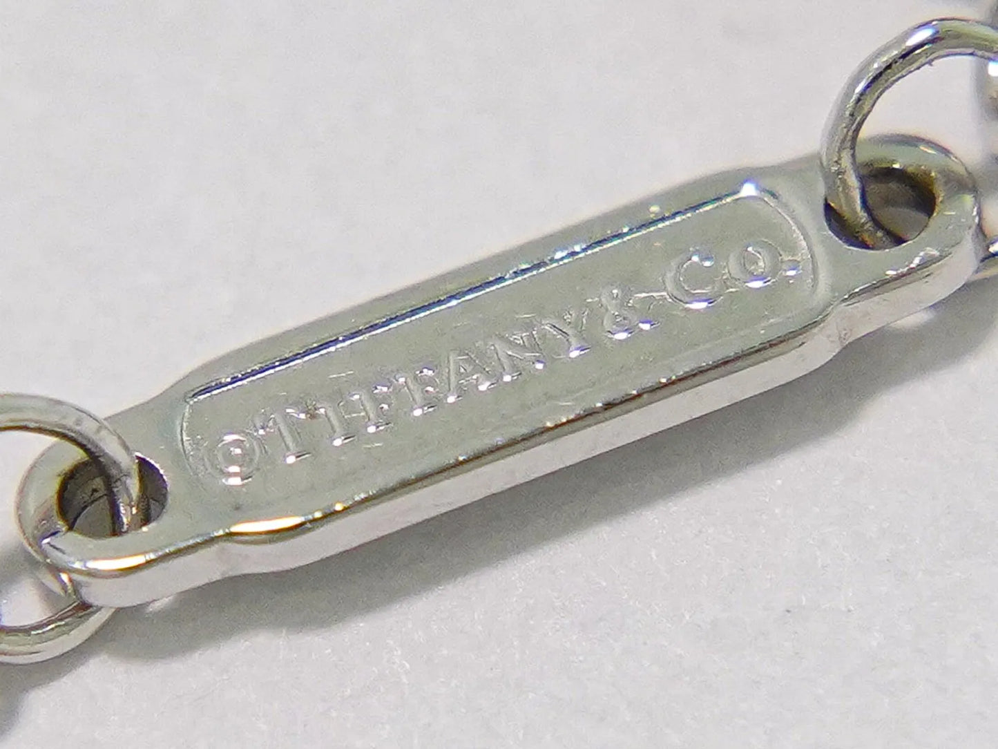 Tiffany & Co. T Smile Pendant 18K White Gold with Pink Sapphires, Silver, White Gold, Necklace