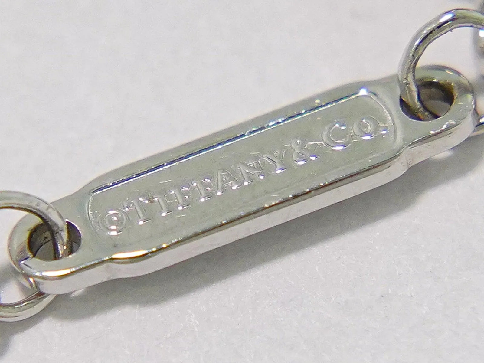 Tiffany & Co. T Smile Pendant 18K White Gold with Pink Sapphires, Silver, White Gold, Necklace