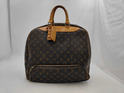 Louis Vuitton Evasion Monogram Canvas, Brown, Canvas, Travel Bag
